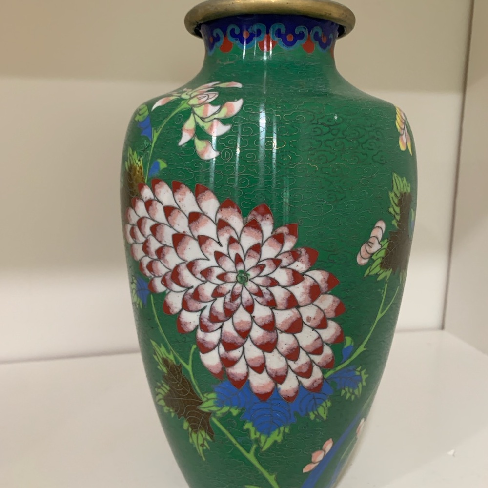 Lovely copper plated ceramic cloisonné vase 8 3/4 by 2 3/4 inches.